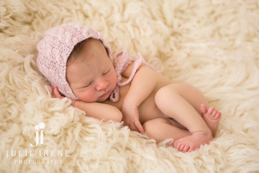 newborn photography pink hat
