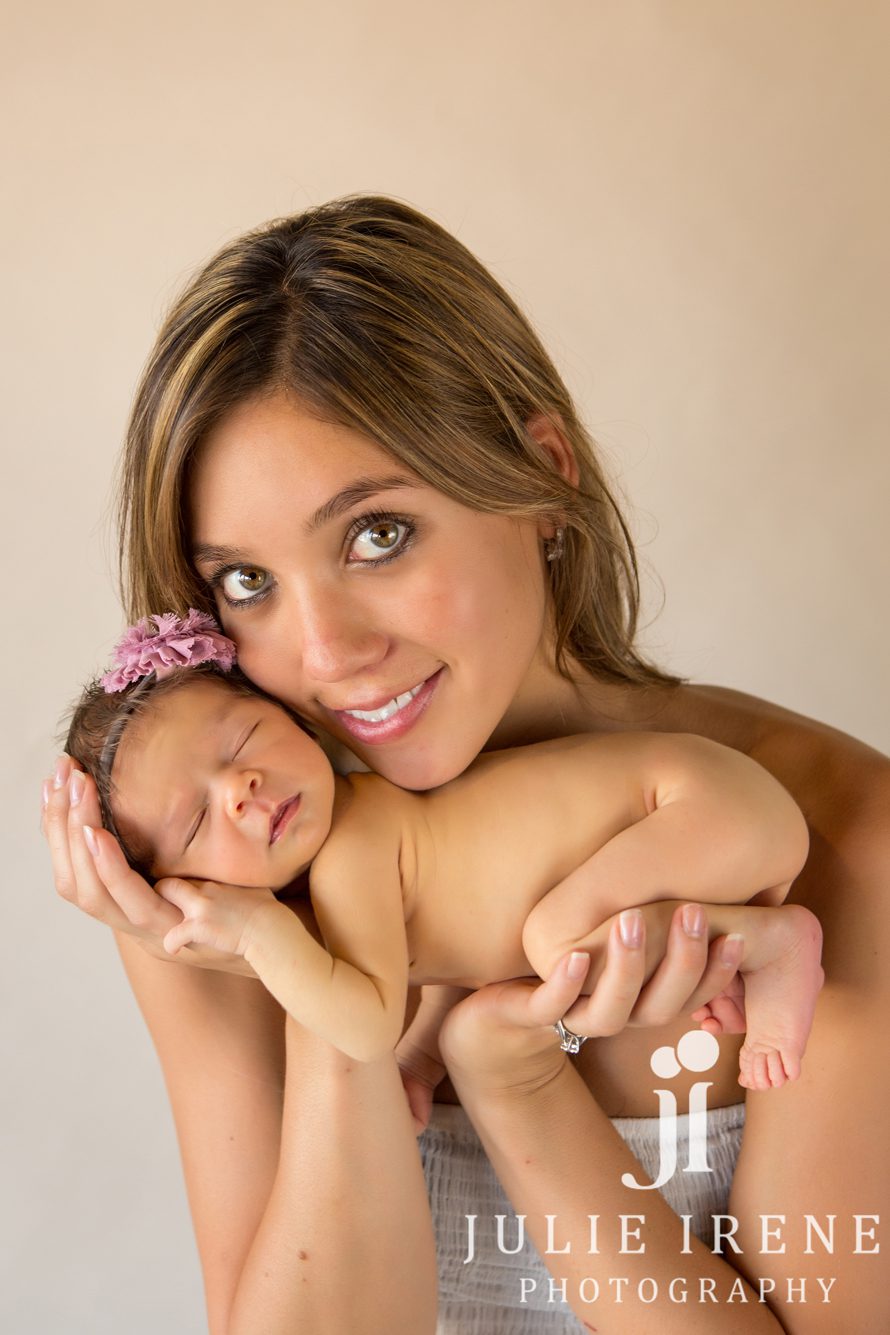 mother daughter unique pose newborn baby photography