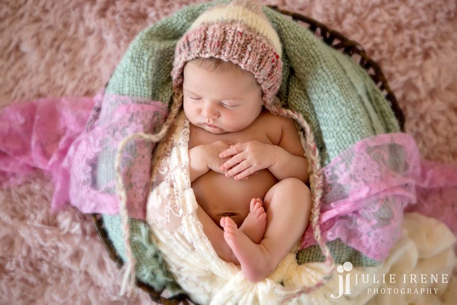 Newborn Baby in a bowl knit hat