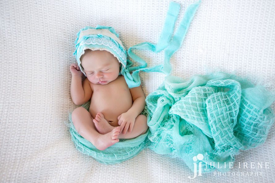 newborn baby girl flowing teal wrap