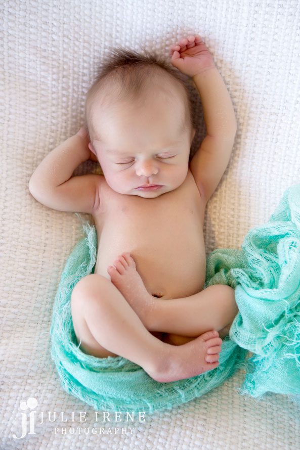 relaxing newborn baby girl