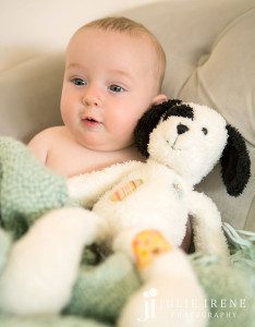 baby boy with his stuffed dog