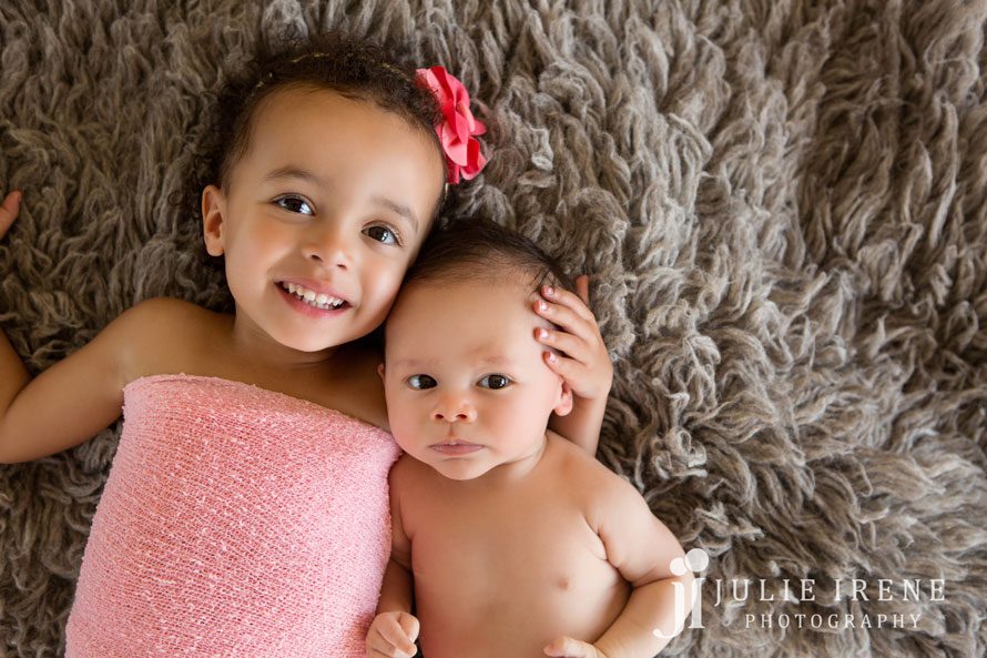 sister and baby brother newborn toddler photo
