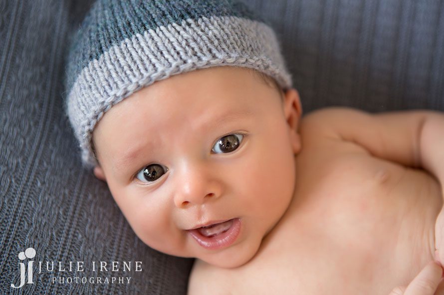 baby boy in blue knit hat