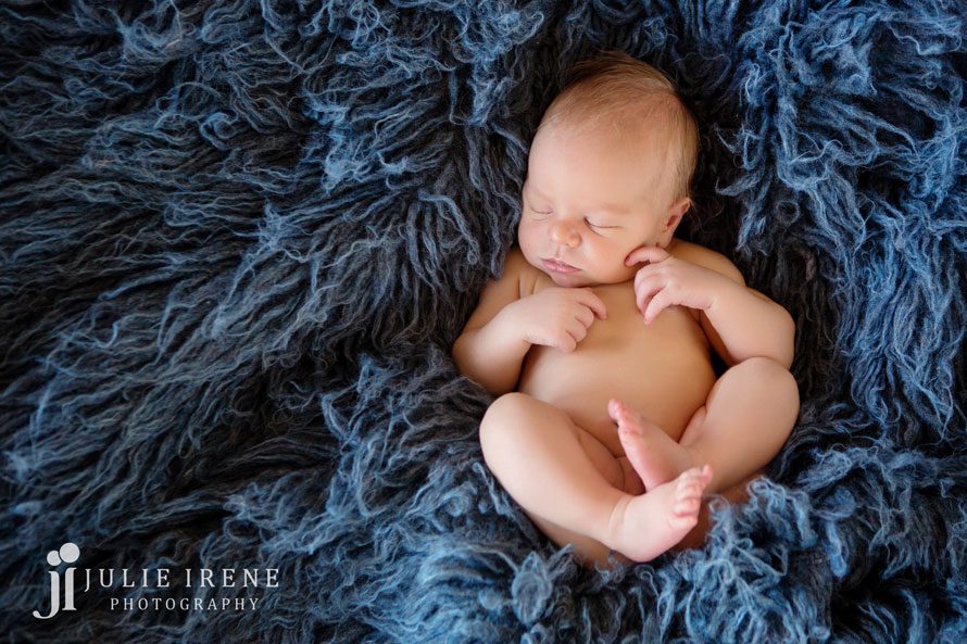 dark blue flokati newborn baby boy photo