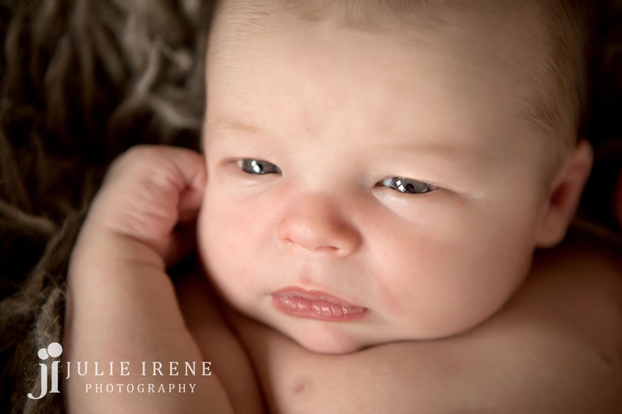 close up of newborn baby boy eyes open