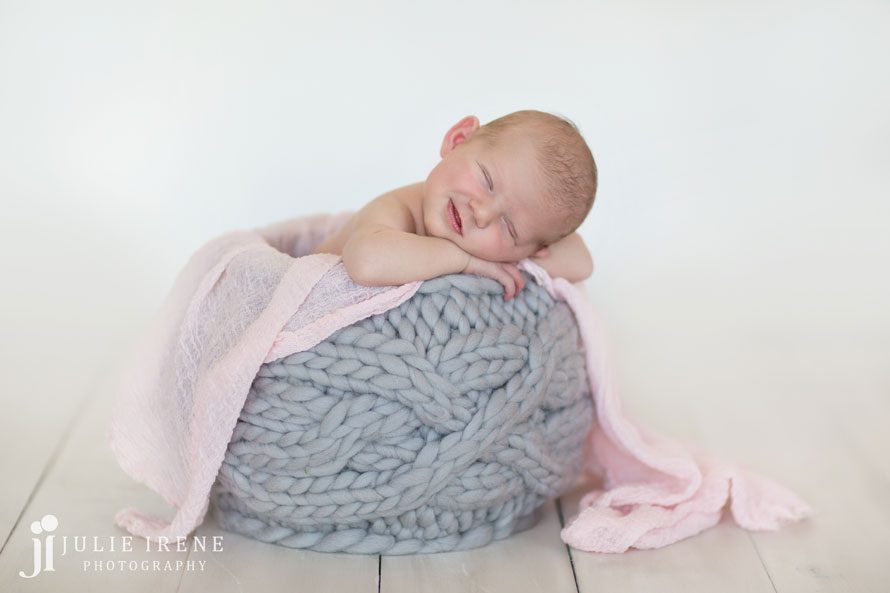smile gray basket newborn girl pink