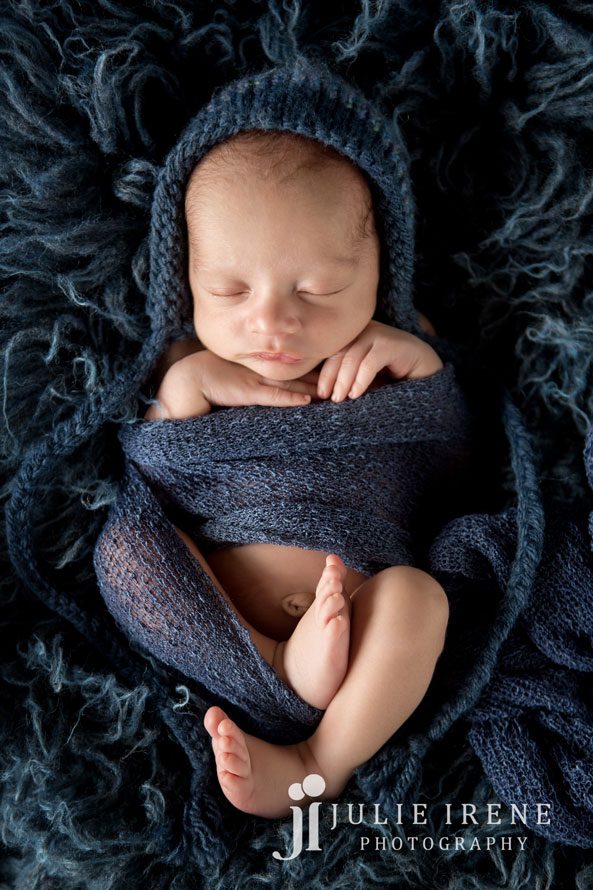 all wrapped up newborn boy blue