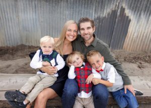 family snuggles in picture at Northwest Open Space