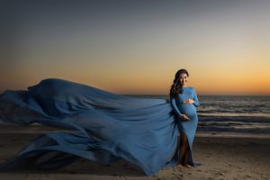 flowing maternity dress at sunset in southern california