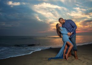 maternity portrait session on the beach at sunset