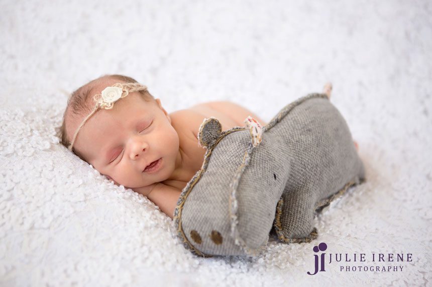 newborn baby with a hippo photography Lily