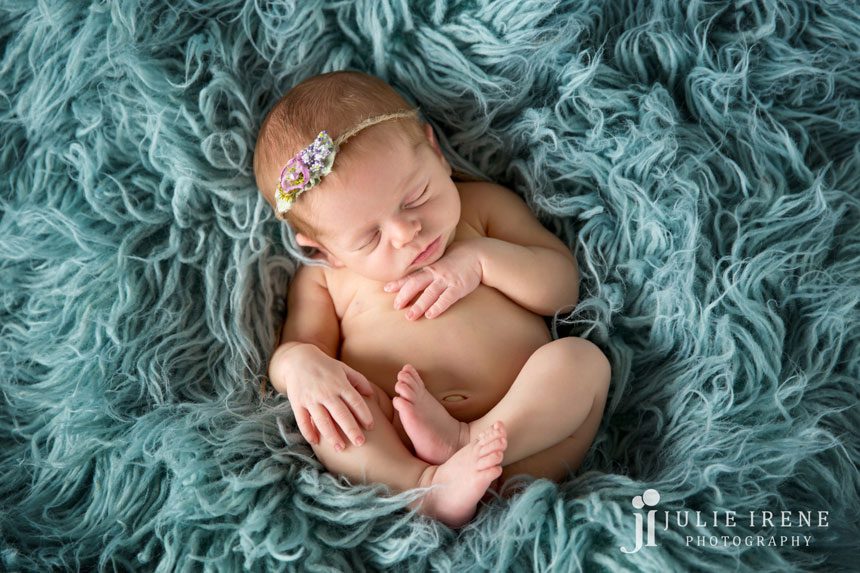 Indianna newborn photo teal flokati