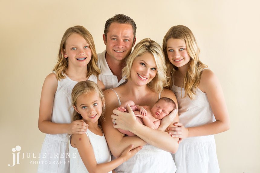 newborn photo with 4 daughters