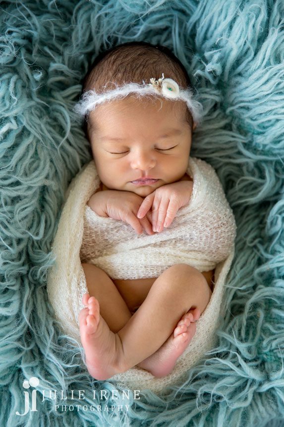 white wrapped pose newborn photography 
