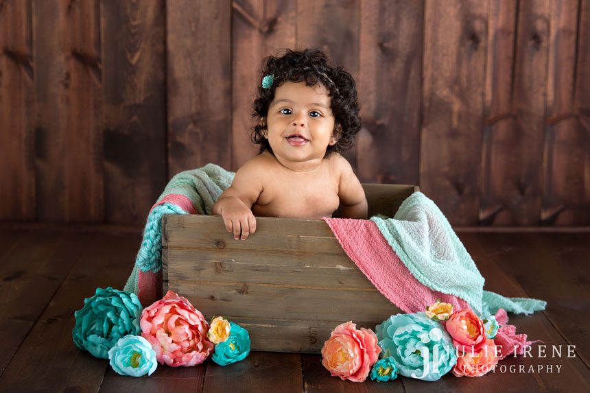 Leona 4 months baby photography session crate flowers