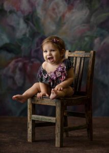 happy 8 month old girl in portraits