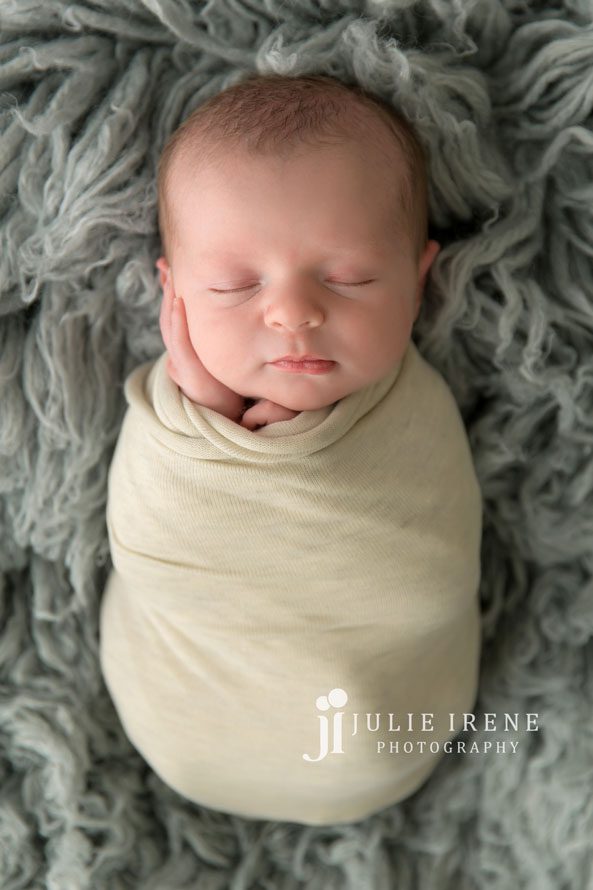 little peanut wrapped up newborn photographer julie irene