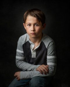 boy portrait wearing gray