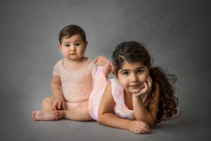 two sisters in pink