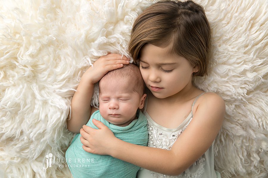 sister and baby brother portrait