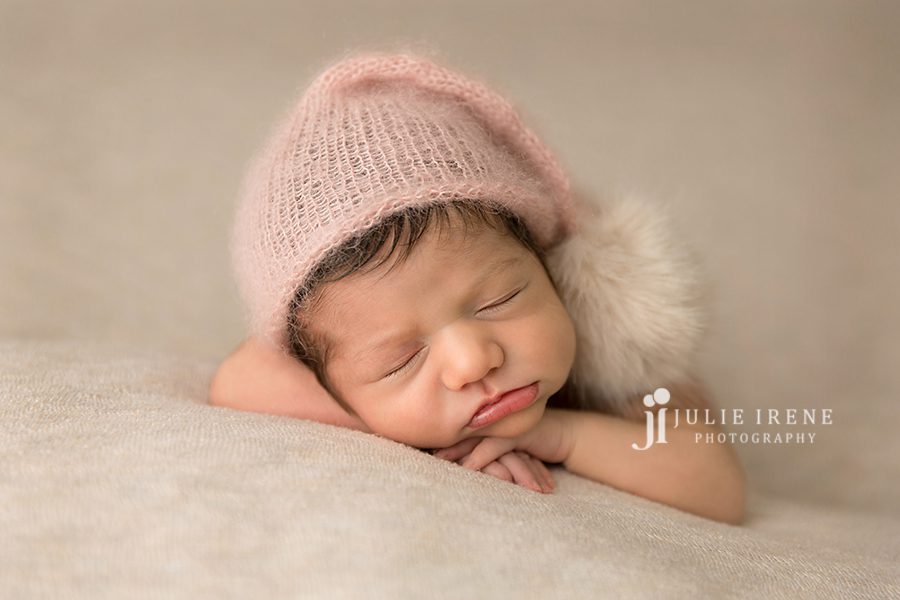 pink santa hat newborn photographer