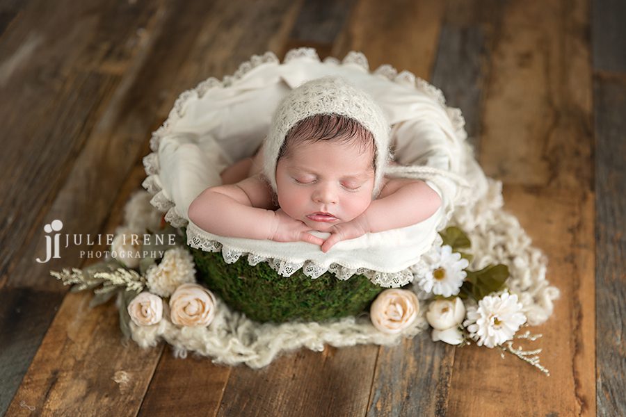newborn photos with fake flowers